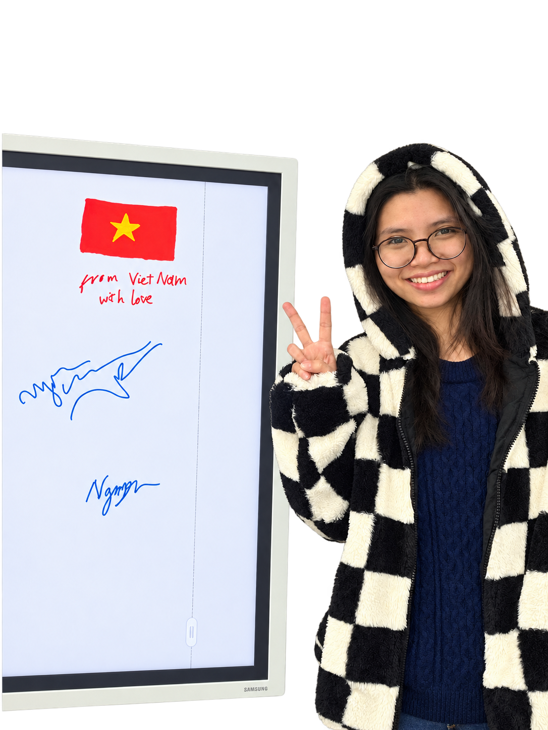 Balas Technologies team member Ngan beside a whiteboard with the Vietnam flag